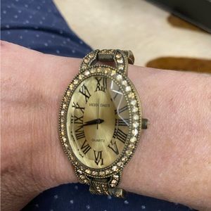 Heidi Daus watch with extension. This watch needs a battery. Open to offers.